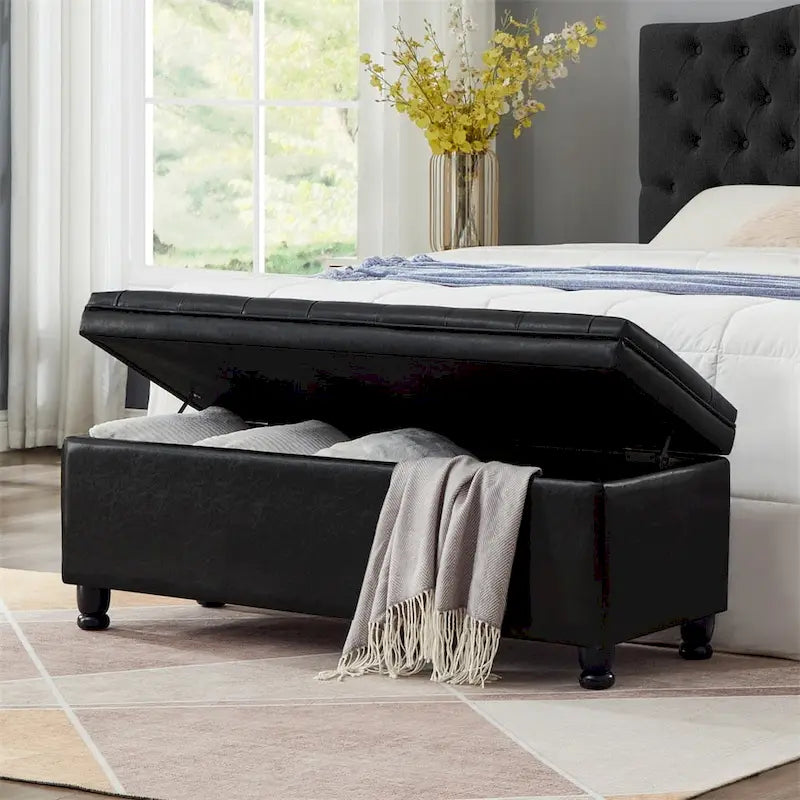Banc de rangement capitonné avec pieds fuselés en bois