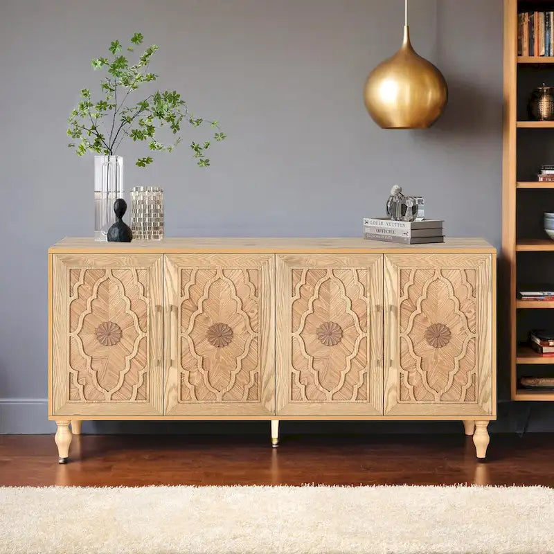 Grand meuble de rangement avec portes sculptées motif floral et poignées en métal, idéal pour le salon, la cuisine ou l'entrée.